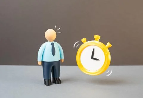 An office worker and a clock illustrating deadlines and time management. Wo.. 스톡 사진