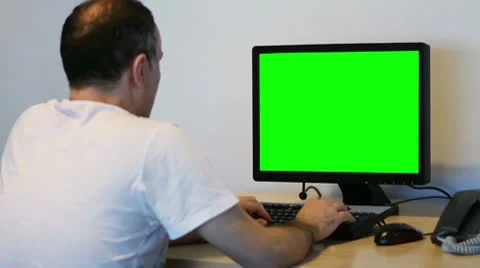 Office Worker and Green Screen Stock Footage 10593700