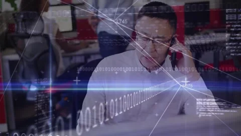 Office worker answering phone and checking docs during work call, HUD overlay Stock Footage 333962154