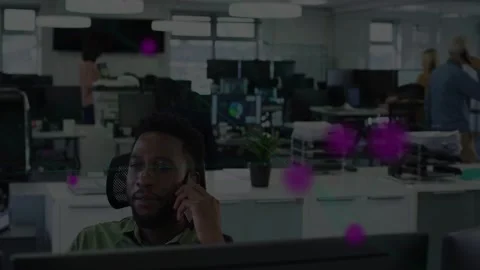 Office worker answering smartphone call coordinating while purple dots drifting Stockbeeldmateriaal 333425546