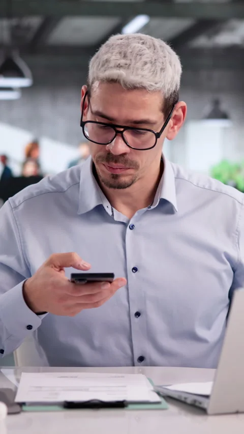Office Worker Carefully Taking A Photo Of A Document Stock Footage 332905726