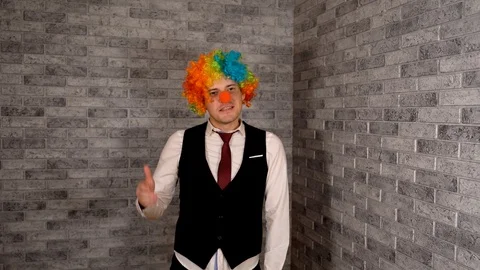 Office worker in clown wig, clown concep... | Stock Video | Pond5