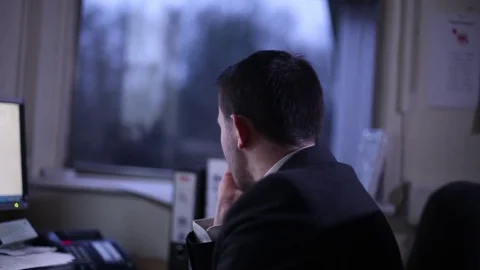 Office Worker Daydreams of Better Things Stock Footage 72032694