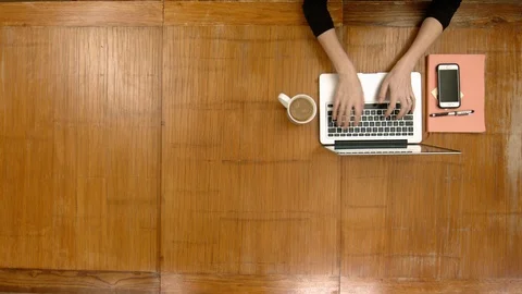 Office worker at desk overhead shot Stock Footage 88129178