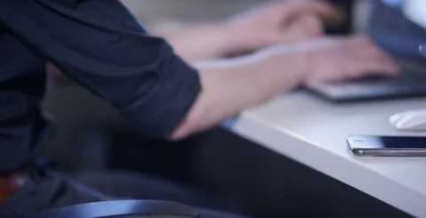 Office worker distracted by smartphone Stock Footage 108515168