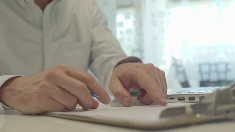 Office worker doing paperwork Stock Footage 75170248