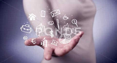 Office worker with drawn icons in the palm Stock Photos