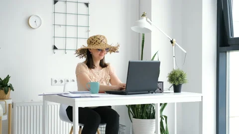 Office Worker Dreaming of Vacation while Working Stock Footage 154344693
