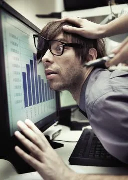 Office worker forced to work harder Stock Photos