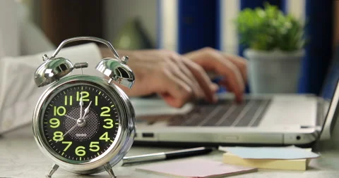 Office worker going to lunch, an alarm clock. Work Time concept Stock Footage 139762048