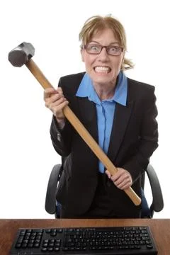 Office worker with hammer Stock Photos