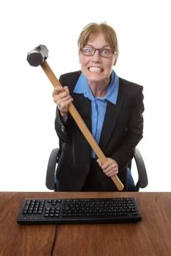 Office worker with hammer Foto stock