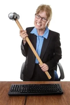 Office worker with hammer Stock Photos