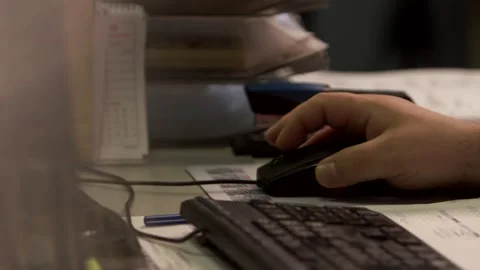 Office Worker Hand On Computer Mouse Beside Paperwork, Busy Desk, Close Up Stock Footage 341304473