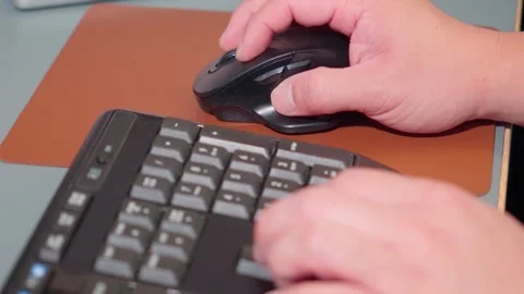 Office Worker Hands Using Computer Mouse and Keyboard Close Up Stock Footage 341919388