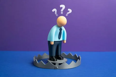 The office worker has gotten himself into a trap. The businessman doesn't kno Stock Photos