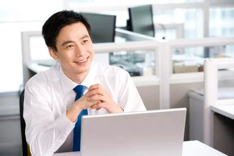 Office worker at his desk Stock Photos