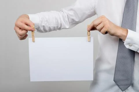 Office worker holding blank piece of paper Stock Photos
