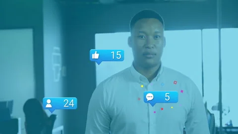 Office worker initiating comment bubble animation and watching social media Stock Footage 311678812