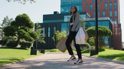 Office worker lady after her lunch time came back to work she walking to the Video stock 164871087
