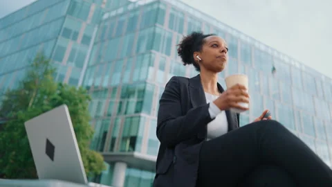 Office worker lady preparing to working day, drinking coffee outdoors in morning Stock Footage 344391293