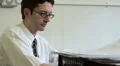 Office worker leaves office on phone HD Footage