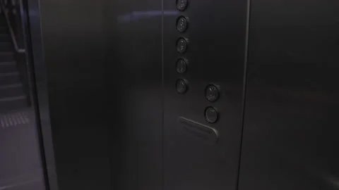 Office Worker Man Enters Elevator Presses Floor Level Button Up Close Of Video stock 167939978