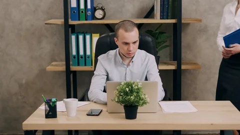 Office worker man gets job of boss women Stock Footage 104871745