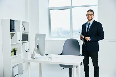 Office worker near the desktop work process computer Stock Photos