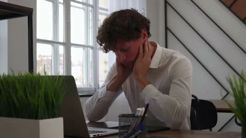An office worker is nervous at the workplace Stock Footage 223374427