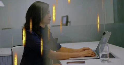 Office worker opening laptop for work typing pausing and leaning while amber Stock Footage 329870524