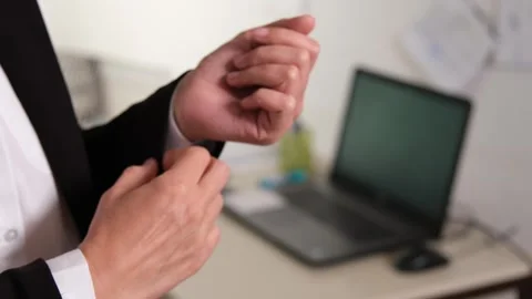 An office worker or a man in a white shirt and black jacket, a boss or Stock-Footage 318210503