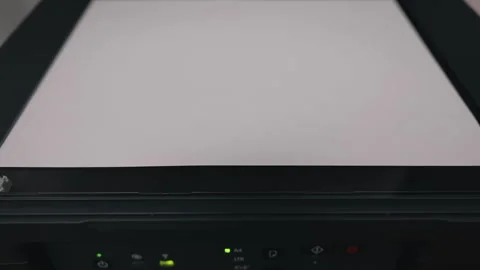 Office worker placing blank paper on multifunction scanner Stock Footage 344063831