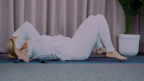 Office worker practicing gentle back stretch to improve spine health. Short Video stock 301524894
