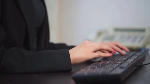 The office worker prints on the keyboard Stock Footage 81641977