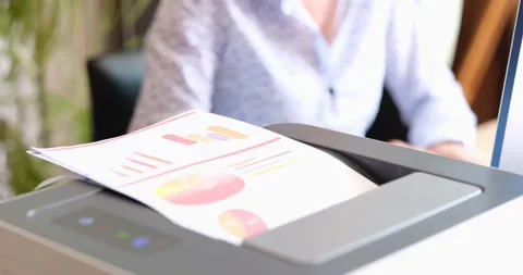 Office worker prints paper on multifunctional laser printer Stock Footage 204907905