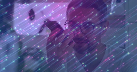 Office worker raising handset after business call alert and speaking with Stock Footage 313242545