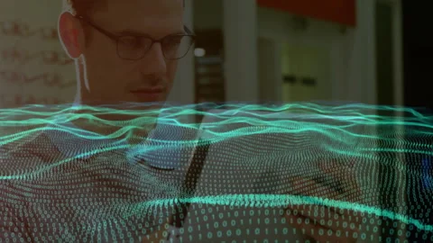 Office worker reaching for smartphone and activating binary waves for technology Stock Footage 311901181