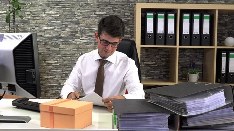 Office worker received a gift at the workplace Stock Footage 116477993