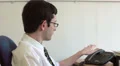 Office worker receives surprising news HD Footage