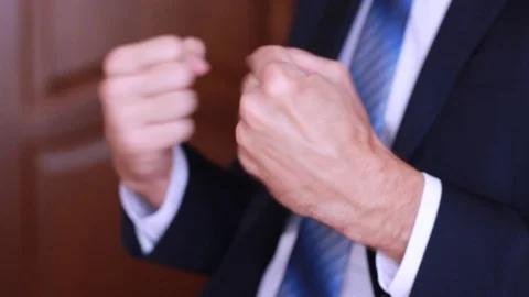 Office worker rotating hands/warming up Stock Footage 90834244