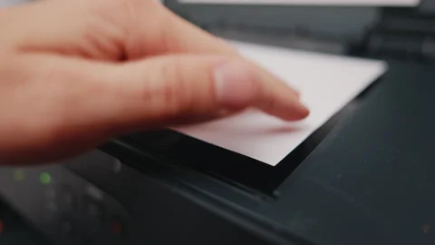 Office worker scanning document using desktop scanner Stock Footage 344064042