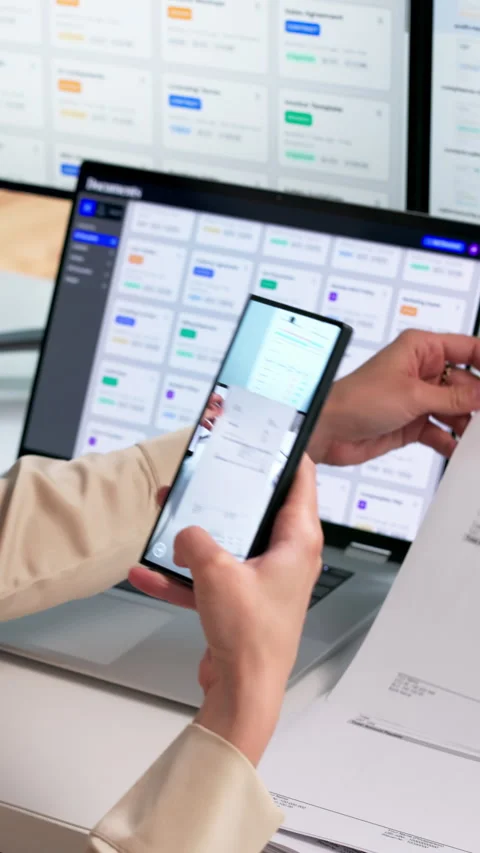 Office Worker Scans Documents Using Smartphone Stock Footage 337642272