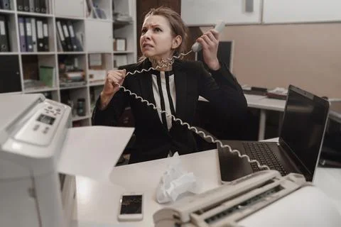 Office worker stressed. Overworked concept. Angry businesswoman. Stock Photos