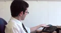 Office worker takes worrying phone call HD Footage