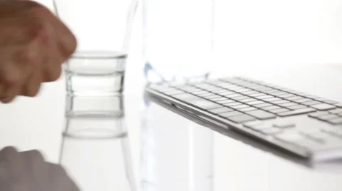 Office worker taking pills Stockbeeldmateriaal 42726247