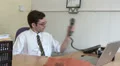 Office worker talking to colleague on phone HD Footage