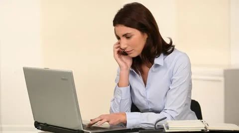 Office worker talking on the phone Video stock 14832124