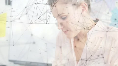Office worker tapping tablet and initiating tech network overlay to analyze Stock Footage 326427469