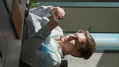 Office Worker Thinks How to Solve a Problem. He Sits At A Table And Twirls A Pen Stock-Footage 129130067